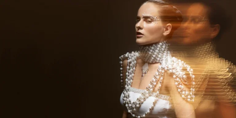 Woman wearing large bejeweled accessories