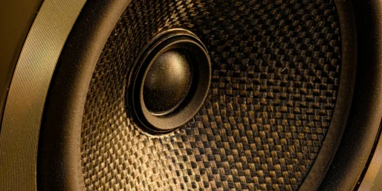 speaker bulat hitam dan coklat