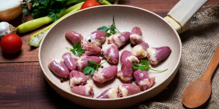 Caraway pan with chicken hearts and herbs inside