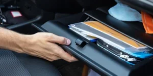 Driver Hand Opening Glovebox Compartment Inside Car