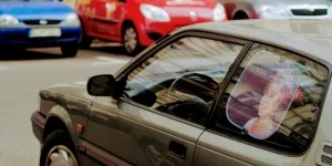 Gray Car With Queen Elizabeth Photo Window Visor Poster