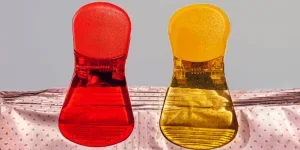 Red and yellow chip clips holding bag together