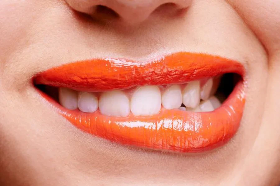 Lips with Orange Lip Gloss