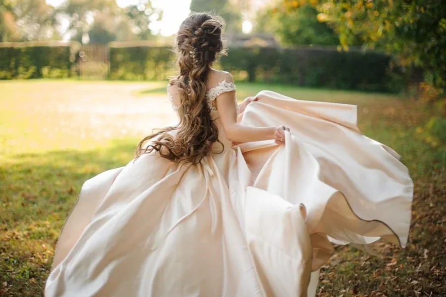 Back View of Beautiful Bride Spinning in a Wedding Dress