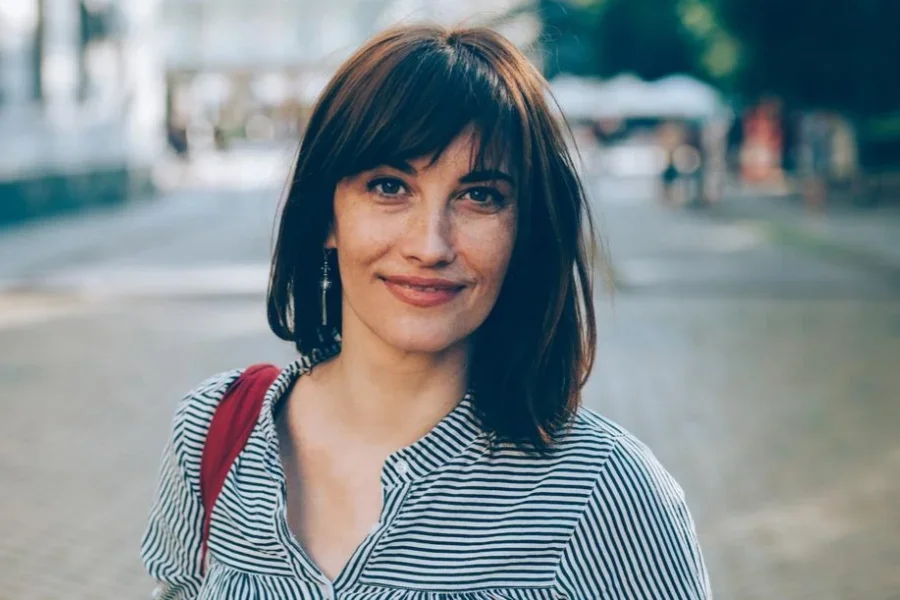 Beautiful Woman With Bang Outdoors