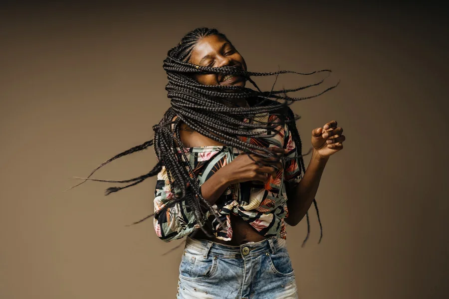 Happy Black Woman Rocking Her Braids