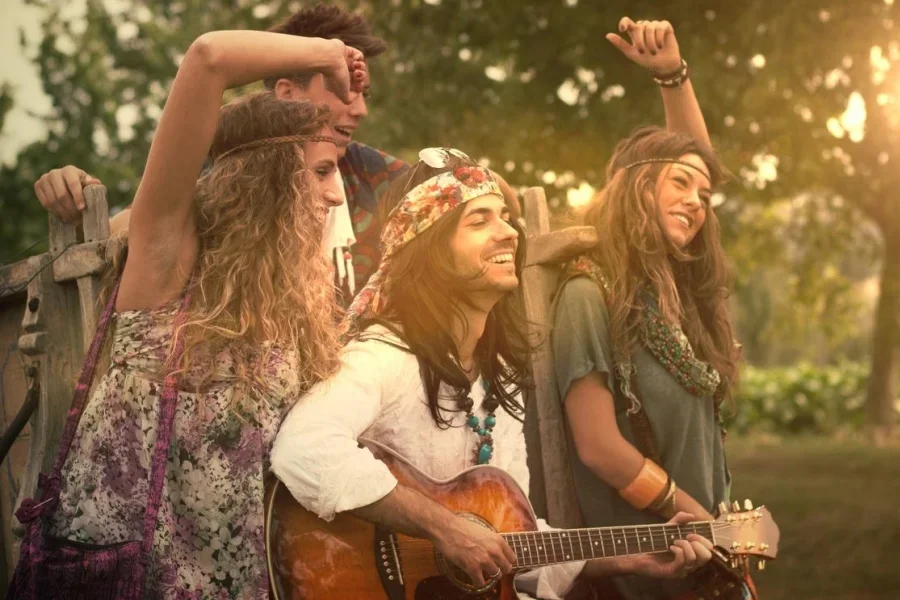 Hippies Dancing and Playing Guitar