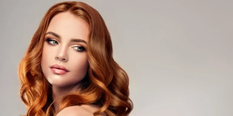 Woman With Voluminous, Shiny and Curly Hairstyle