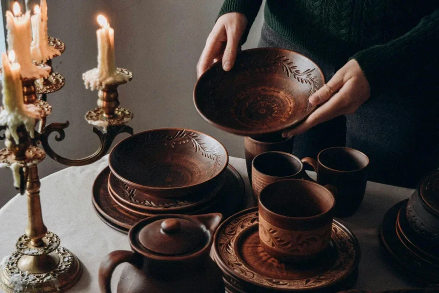 Woman and Traditional Clay Tableware