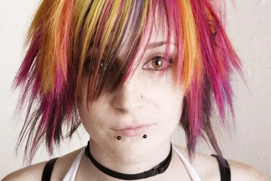 Young Girl with Lip Piercings and Brightly Colored Hair