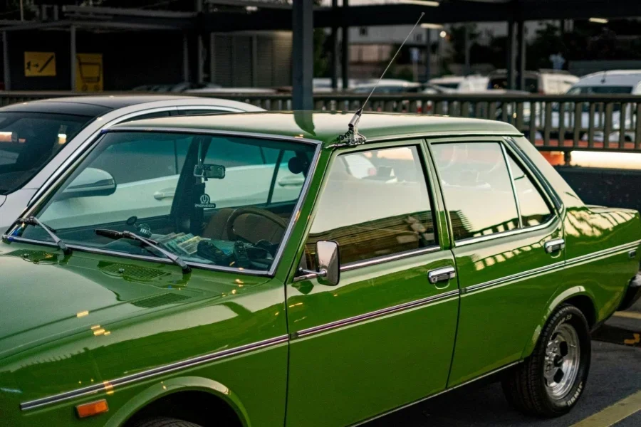 Photo of Green Vehicle Parked