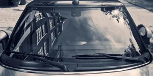 Typically Dutch architecture reflected in a car windscreen